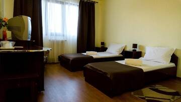 Фото номера Двухместный номер с 2 отдельными кроватями Отель Hotel Dacor г. Орэштие 5