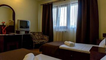 Фото номера Двухместный номер с 2 отдельными кроватями Отель Hotel Dacor г. Орэштие 4